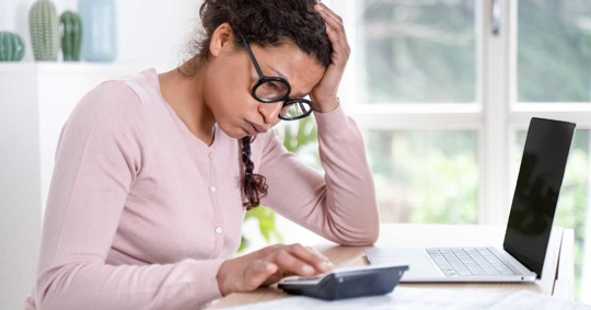 woman worried about bank debt