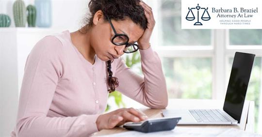 a woman calculating her money